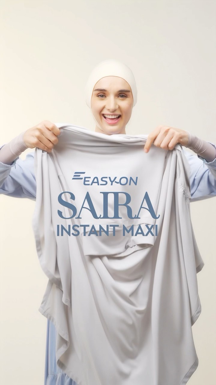 Introducing The EasyOn Saira Instant Maxi. She is a one-size-fits-all slip-on instant hijab made especially for all our modest ladies. Made from stretchable yet breathable crepe fabric, it is cooling on the skin and has gathers on both sides to create a beautiful, elongated draping on your shoulders. Slip it on and you’re ready to go! Launching tomorrow night, #NaelofarBabes. Tell us who you know that will love this instant hijab and tag them!<br/>
<br/>
#new #comingsoon #instanthijab #hijab